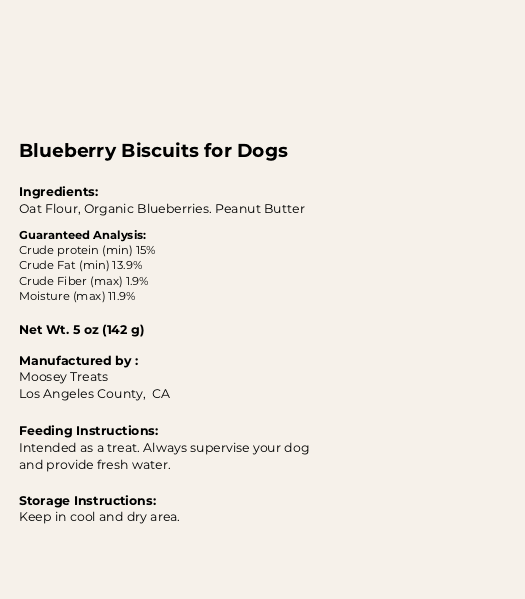 Product label for Blueberry Biscuits for Dogs with ingredients, guaranteed analysis, and manufacturing details.